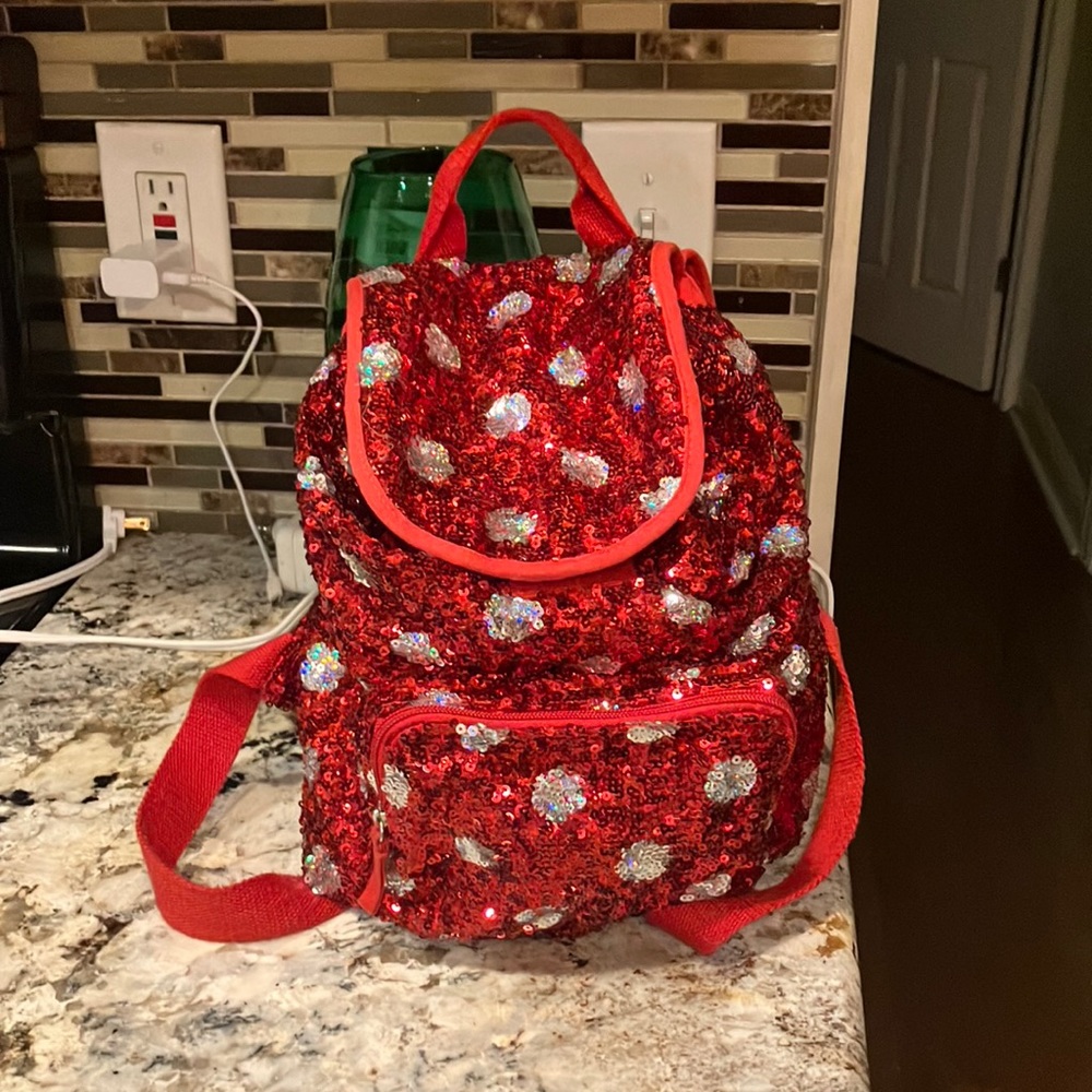 From Disney World Minnie sequin backpack.